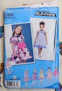 Simplicity 2989 Girl's Dresses -Size 1/2, 1, 2, & 3 - UNCUT Paper Sewing Pattern - Picture 1 of 4