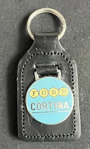 FORD MK1 CORTINA VINTAGE COCHE DE MOTOR ESMALTE CUERO LLAVERO INSIGNIA EMBLEMA - Imagen 1 de 7