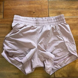 Pantaloncini da corsa Athleta viola chiaro taglia XXS in rete da corsa 4" - Foto 1 di 6