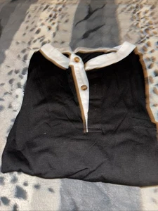 Polo negro de cuello blanco para hombre  - Imagen 1 de 5