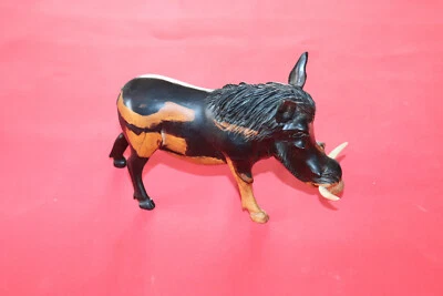 Phacochère en bois d' ébène - Photo 1/4