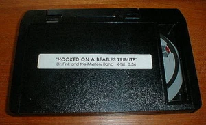 Video promocional de los Beatles "Hooked On A Beatles Tribute" casi nuevo - Imagen 1 de 1