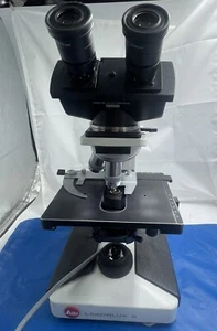 Leitz 020-505.030 Laborlux S Microscopio PL Fluotar 10x & EF 40x Phaco 2 fasi Co - Foto 1 di 3