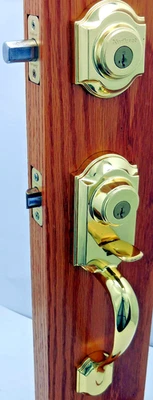 Juego de manijas Kwikset Montara con perilla Juno latón pulido 553MNHXJ3 #94r Foto 1 de 4