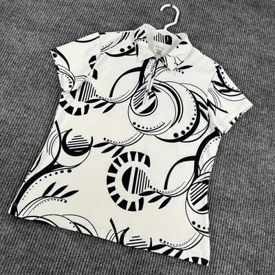 Camisa Polo IZOD Mujer Mediana Blanca Negra Abstracta Manga Corta Rendimiento Foto 1 de 4