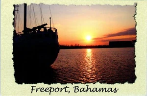 A Typical Freeport Sunset Seen from Lucayan Harbour, Bahamas Postcard - Picture 1 of 2