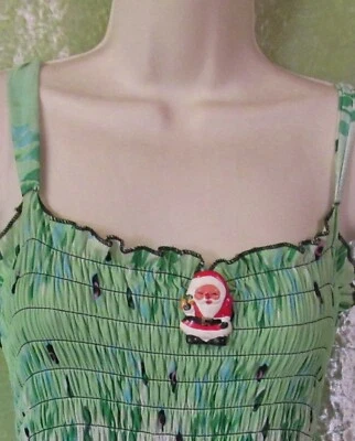 Broche de resina de Santa Foto 1 de 3