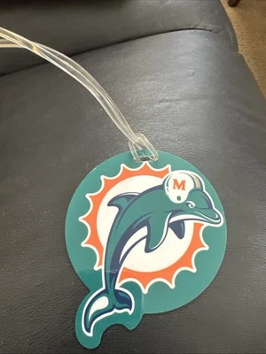 Etiqueta de equipaje Miami Dolphin firmada por Ronnie Brown corredor Foto 1 de 4