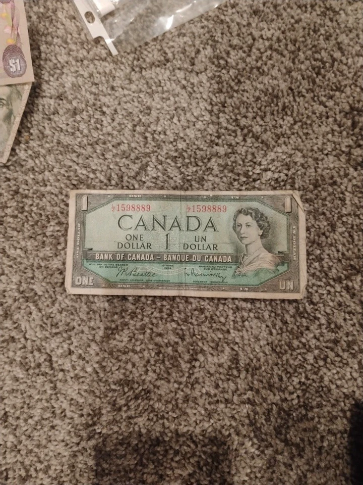 Billete de $1 del Banco de Canadá 1954 con número de serie sólido raro. Clasificado PMG. SOLID 2'S  Foto 1 de 1