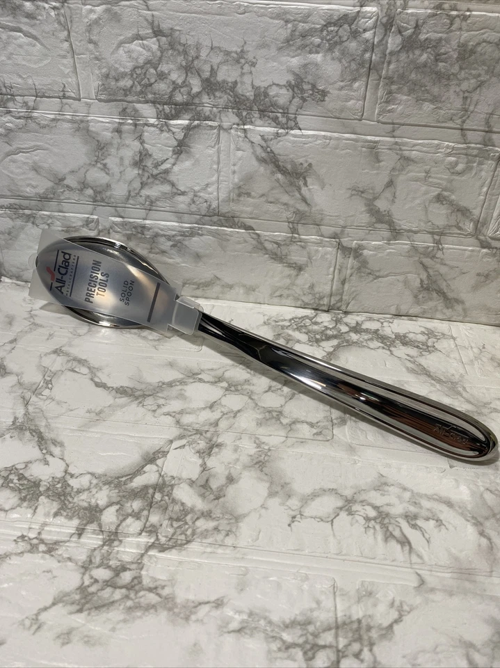ALL-CLAD SOLID SPOON.