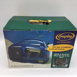 RADIO SOLAR Y AUTOALIMENTADA Freeplay de colección AM/FM manivela de viento FPR2 transparente NUEVO EN CAJA - Imagen 1 de 19