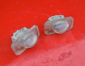 01 02 03 04 05 JUEGO DE LUCES DE MATRÍCULA TRASERA HONDA CIVIC PAR AMBOS OEM SEDAN - Imagen 1 de 3