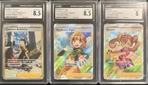 CGC 8.5 CYNTHIA'S AMBITION 8.5 GARDENIA'S VIGOR 8 SHAUNA SWORD & SHIELD POKEMON - Picture 1 of 2