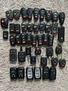 LOT OF 44 MISCELLANEOUS OEM VOLVO NISSAN HONDA RAM SMART KEY REMOTE HEAD FOB NR! - Picture 1 of 2