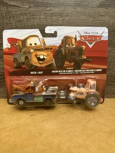 DISNEY PIXAR CARS MATER und Traktor mit Reifen im Mund 2026 🎄2 Stück - Bild 1 von 4