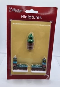 Juego de 3 miniaturas de esquinas de adoquines de pueblo de Navidad planta ladrillo lámpara de seto - Imagen 1 de 6