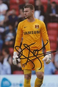 LEYTON ORIENT: JAMIE JONES SIGNED 6x4 ACTION PHOTO+COA - Picture 1 of 1