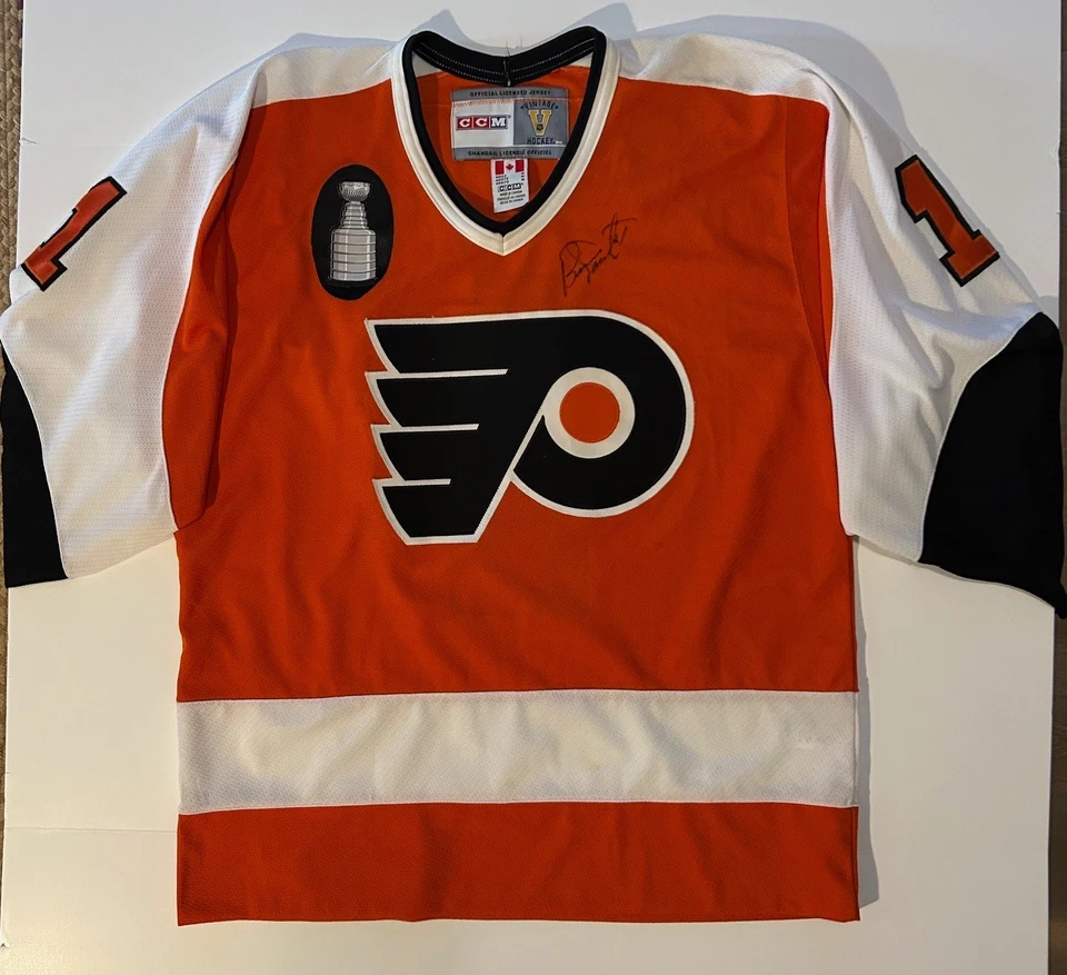 Camiseta deportiva firmada por Bernie Parent estilo vintage Philadelphia Flyers Foto 1 de 4