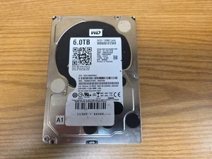 Disque dur noir Western Digital WD WD6001FZWX 6 To avec 128 Mo de cache 6 Go/s 7 200 tr/min 3,5" - Photo 1/1