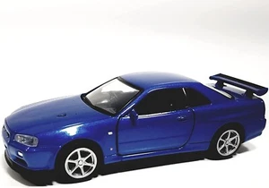Coche diecast diecast Showcast Nissan Skyline GT-R34 V azul metálico techo rígido escala 1/36 - Imagen 1 de 5