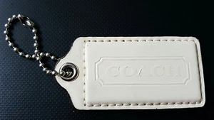COACH LARGE PATENT LEATHER HANGTAG OFF WHITE WITH SILVER TONE GROMMET AND CHAIN  - Picture 1 of 2