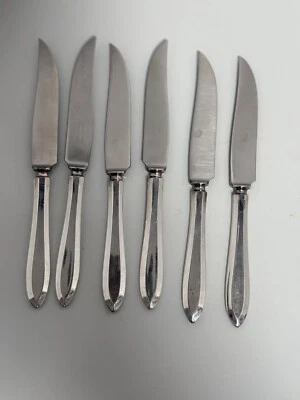 Antique community stainless knives with silver plate  handles 7 in all - Image 1 of 3