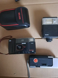 3 analoge Fotoapparate + Zubehör, Braun Bravo M, Agfamatic 2008, + Bauer Blitz - Bild 1 von 3