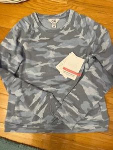 ATHLETA GIRL WARM UP PRINTED HEATHER BLUE CAMO SWEATSHIRT SIZE LARGE/ 12 NEW - Picture 1 of 2