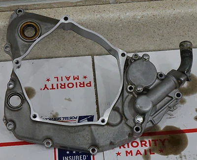 Kawasaki KX250F 2009-2012 OEM cubierta de embrague interior y bomba de agua 14032-0136 Foto 1 de 4