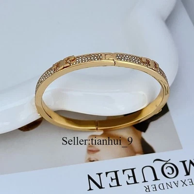 New! Tory Crystal Sheif-T Hinged Bracelet Gold with Jewelry Pouch - Image 1 of 3