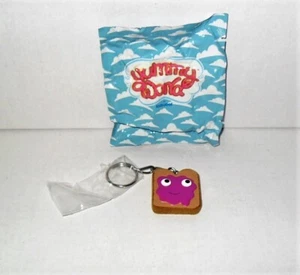 Llavero de vinilo Kidrobot Yummy World Yummy-Licious serie tostada de uva - Imagen 1 de 1