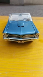 Maisto 1965 Pontiac GTO Special Edition 1:18 Diecast Model Car - Foto 1 di 4