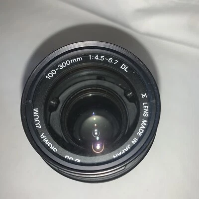 Lente teleobjetivo Sigma 100-300 mm f/4,5-6,7 DL para Minolta AF con montaje para capó Foto 1 de 4