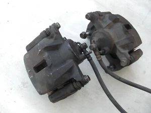 FRONT CALIPER WITH BRACKET PAIR TOYOTA MATRIX VIBE COROLLA 2003 - 2008 - Picture 1 of 4
