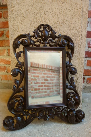 19th century Petite Antique French Carved Dark Oak Beveled Wall Mirror Louis XV Cover