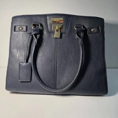 Bolso de Mano BCBG Paris Cuero Azul Texturizado Forrado con Bolsa Antipolvo Negra Foto 1 de 4