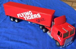 1980-90s MC Toys, Yatming, Mack Flying tigers Truck, 1:43rd scale plastic model