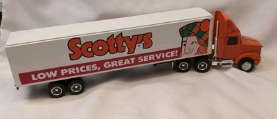 Camión y remolque GMC Scotty's ERTL blanco #3027 Volvo T760 hecho en México 1/64 Foto 1 de 4