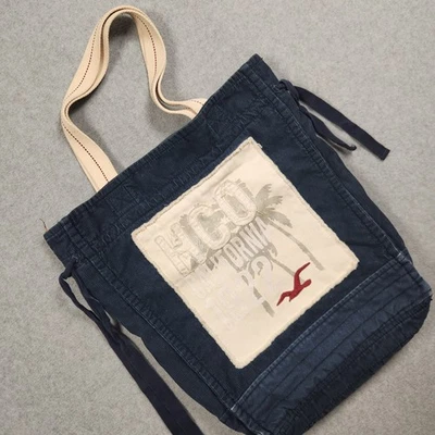 Bolso de Mano Hollister Azul Lona Pana Correas Cordón Acento Lateral Bolso Foto 1 de 4