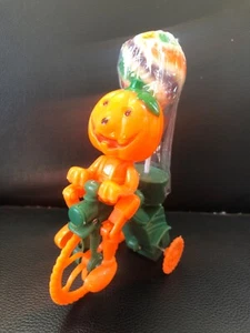 PUMPKIN PEDDLING HALLOWEEN TRICYCLE WIND-UP TOY HARD PLASTIC BY MIDWOOD BRANDS - Picture 1 of 4