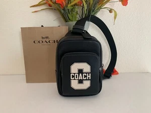 NWT Coach CAJ39 Racer Sling Pack with Varsity Motif Pebble Leather Black/Chalk - Picture 1 of 10