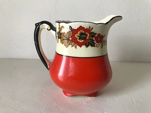 Jarra crema antigua Wedgewood & Co naranja, blanca y negra con flores de 3 1/4" de alto - Imagen 1 de 5