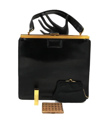 Bolso de mano vintage años 50 - EVANS ELEGANCE - cuero negro estructurado Foto 1 de 4