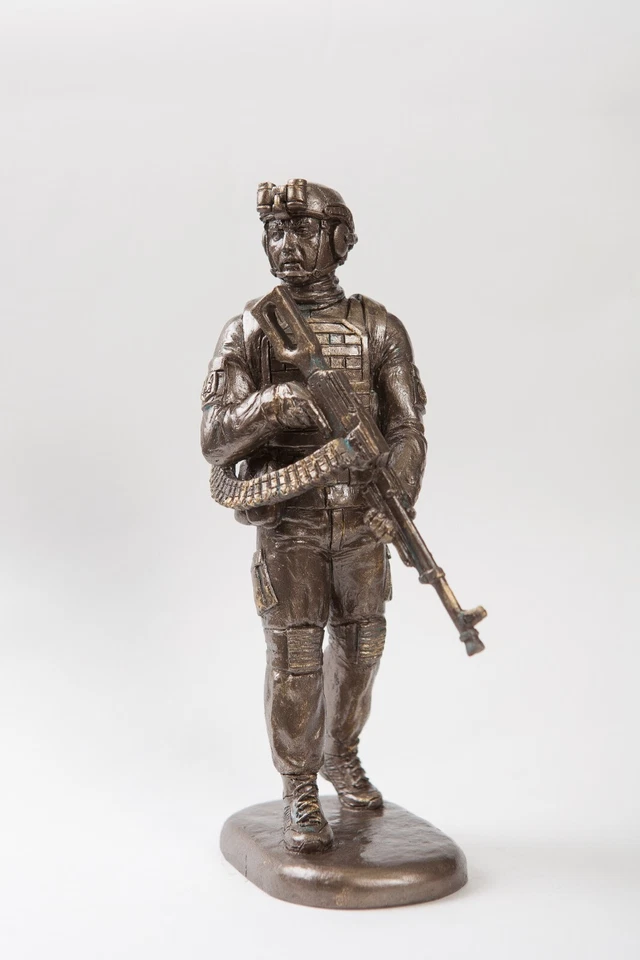 Estatuilla "Machine artillero" Foto 1 de 4