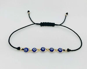 Pulsera Negra Con Ojitos Azules Oro Laminado Blue Evil Eye Bracelet Gold Filled - Picture 1 of 4