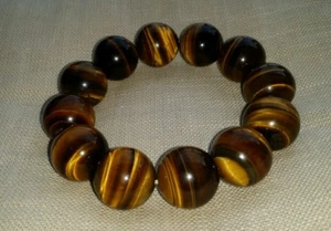 Alte Armkette Tigerauge mit riesigen geschliffenen Kugeln Durchmesser ca. 18 mm  - Bild 1 von 5