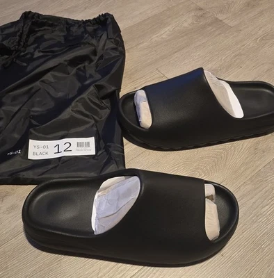 Yeezy Slide Negro YS-01 NUEVO AUTÉNTICO 2025 YZY - HOMBRE TALLA 12 EE. UU. Foto 1 de 4