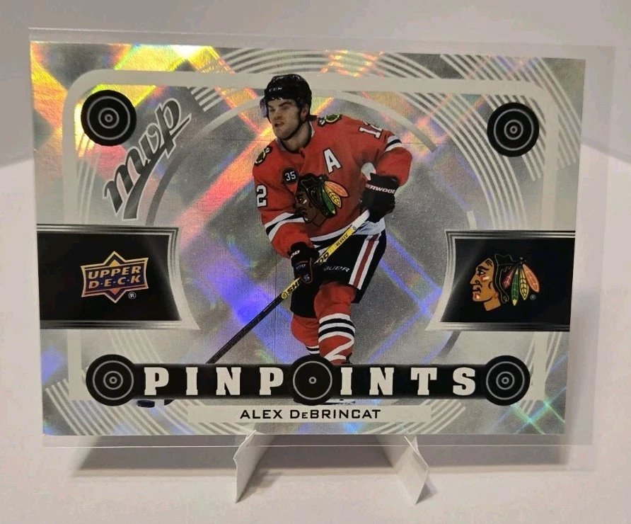 2022-23 Upper Deck MVP #PP-11 Alex DeBrincat Pinpoints Chicago Blackhawks - Image 1 of 2