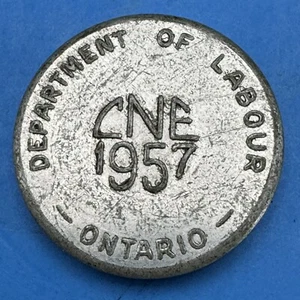 1957 CNE Department of Labour Safety Pays Token (#CB-1-1-18) - Imagen 1 de 2