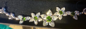 STERLING BRACELET GREEN AND WHITE CRYSTAL STONES FLOWER DESIGN, 7" LONG - Picture 1 of 5